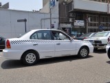New Cairo white taxi