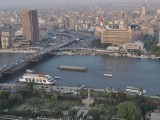 view of the nile river and some boats passing