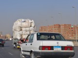 Traffic in Cairo Egypt with overloaded cars