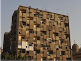 Heavley populated building in Cairo, Egypt and lost of air conditioners